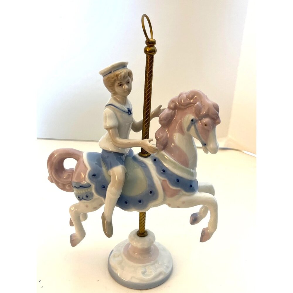 Boy on Carousel Horse by Paul Sebastian 1990 Porcelain Bbrass Pole 9”